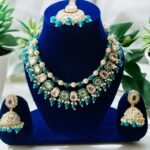 Piyaasi Gold Toned & Green Traditional Kundan Studded Jewellery Set